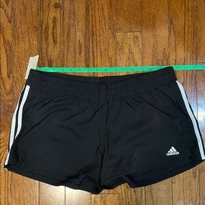Women’s adidas black and white large athletic shorts with elastic waistband